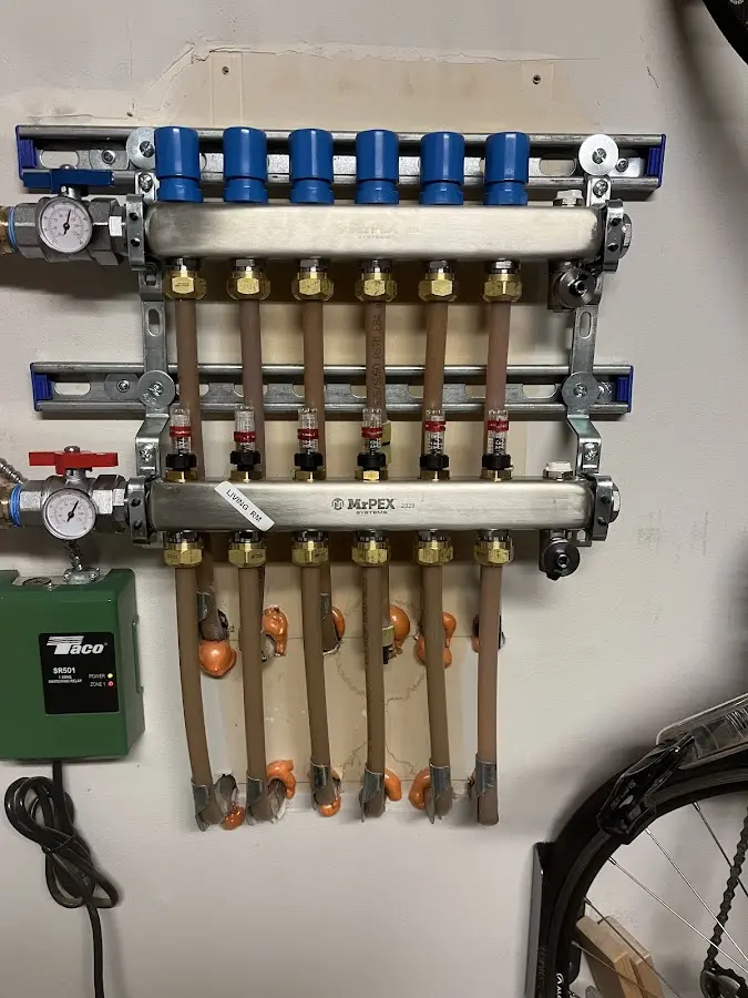 Plumber performing Gas Line Installation at a residential property in Alfred